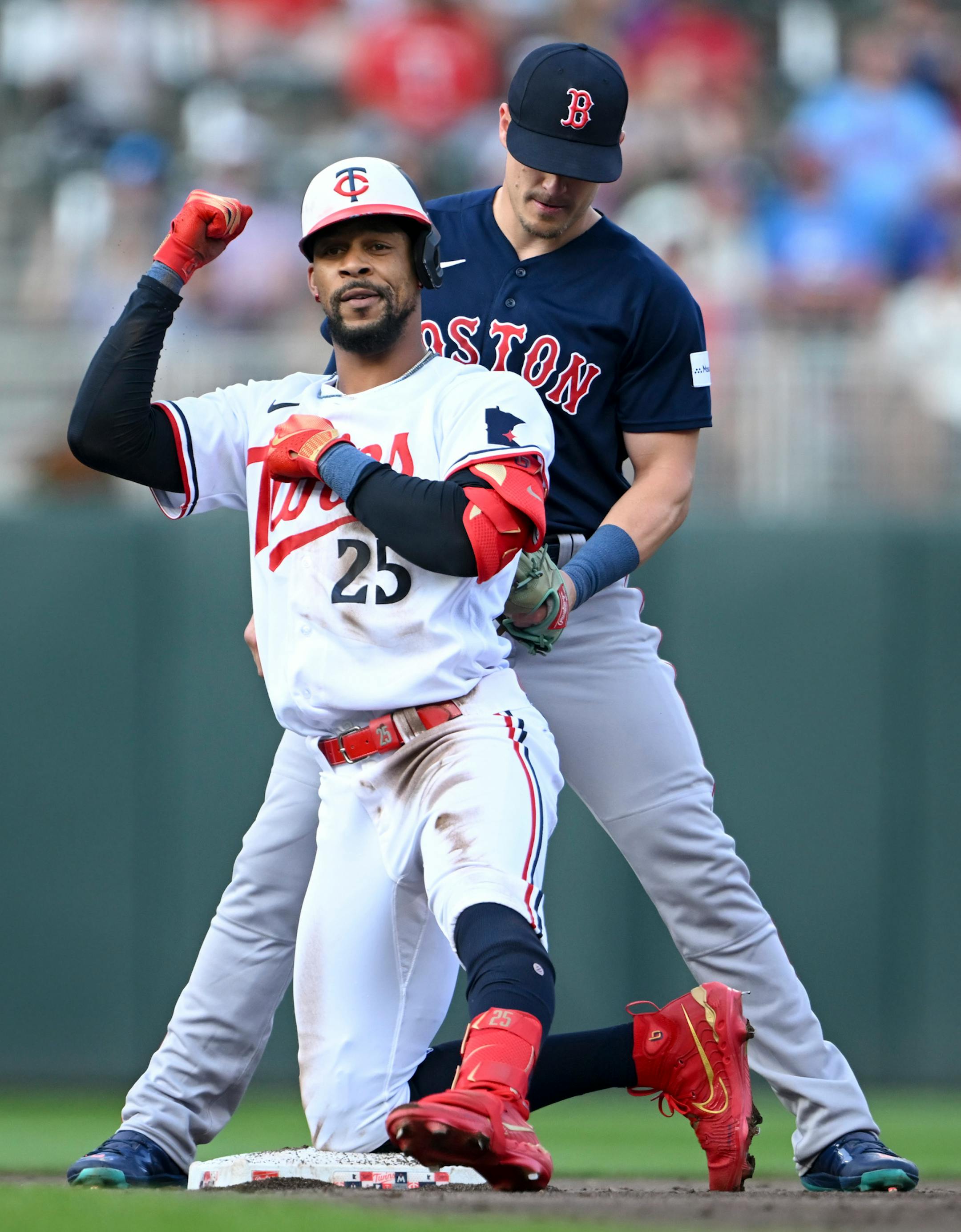 Minnesota Twins designated hitter Byron Buxton (25) reacts after hitting a double in the bottom of the second inning against the Boston Red Sox Wednesday, June 21, 2023, at Target Field in Minneapolis, Minn.
