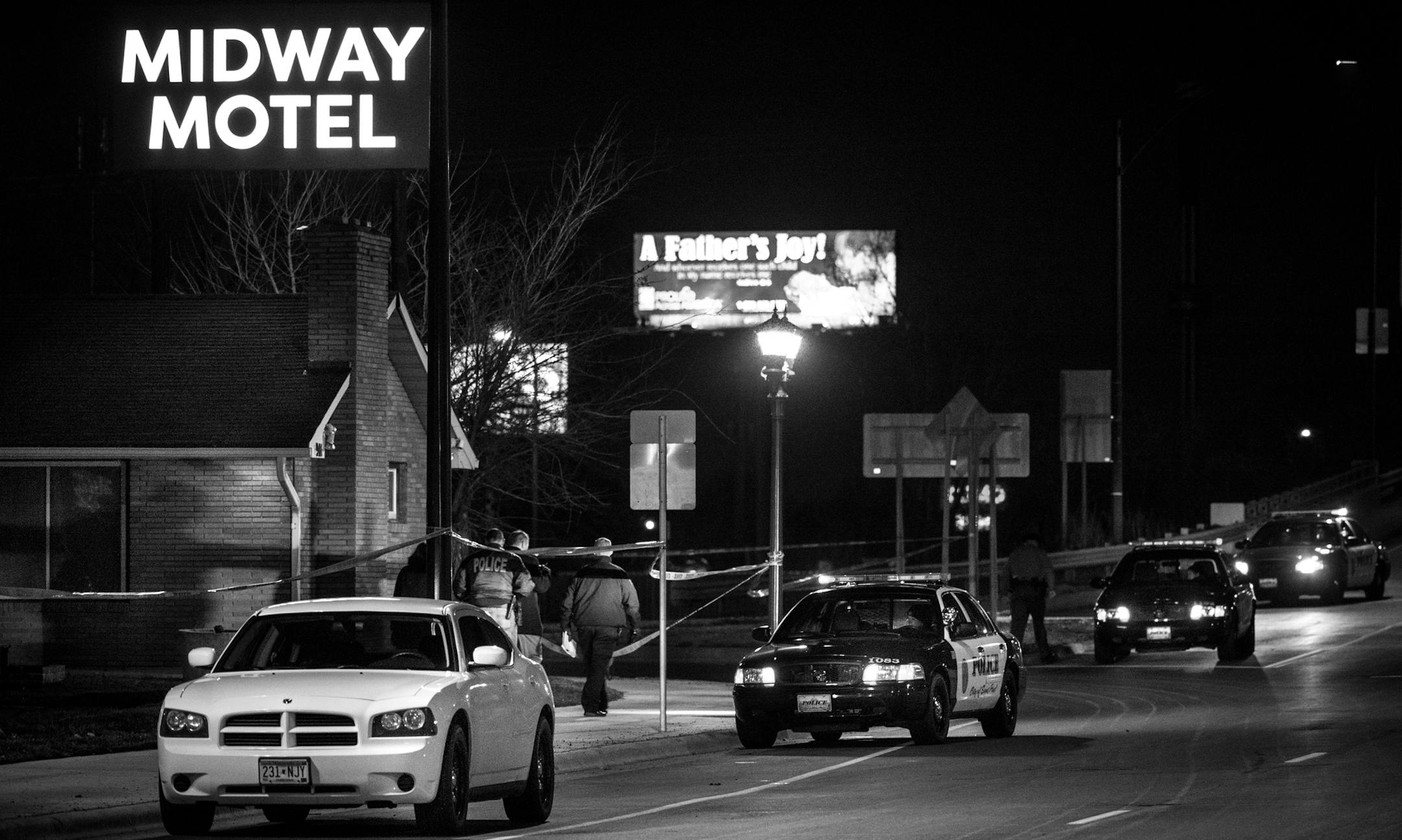 11:10PM St. Paul Police responded to the scene of a double homicide at the Midway Motel Tuesday night. ] (AARON LAVINSKY/STAR TRIBUNE) aaron.lavinsky@startribune.com We follow the St. Paul Police homicide division as it investigates a double homicide at the Midway Motel committed Tuesday, March 22, 2016 in St. Paul, Minn.