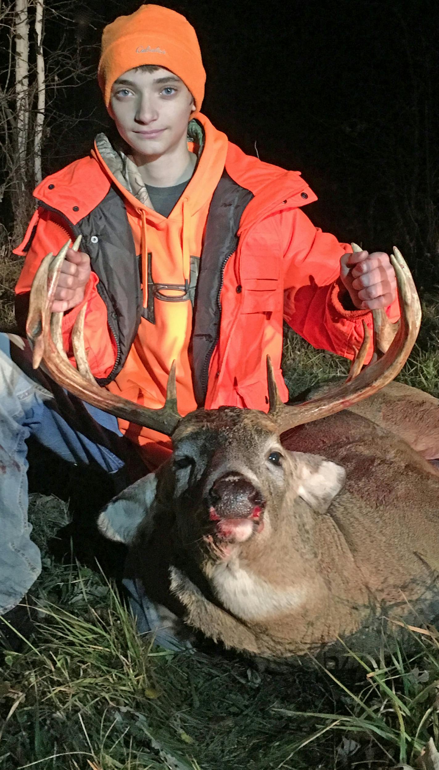 Austin Eccless, pictured with a buck his father, Todd, shot on opening day 2016.