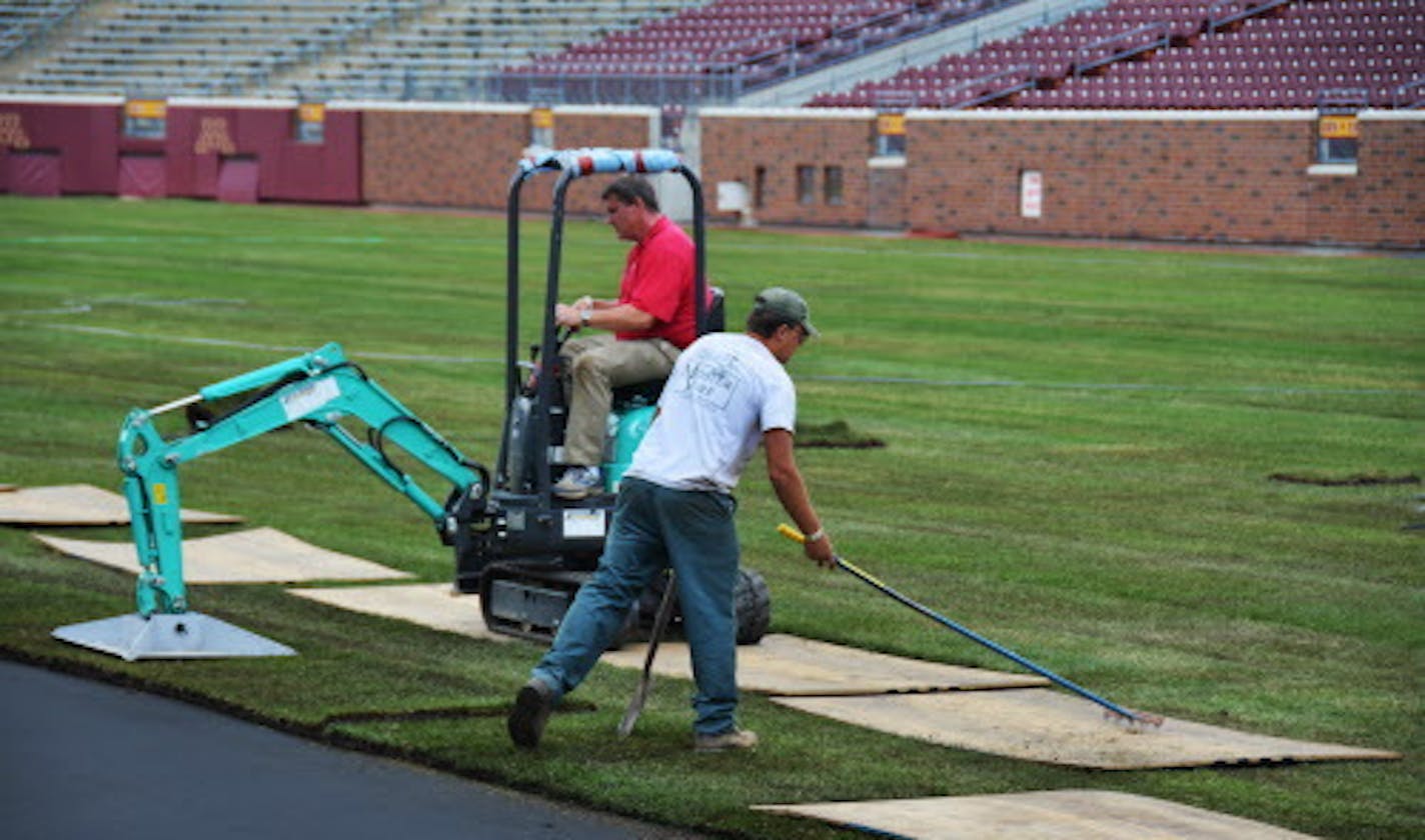 In a TCF Bank Stadium first, the artificial turf is being covered and grass is being put in for a soccer match this weekend pitting two teams from Britain as part of the Guinness International Champions Cup. ] Manchester City and Olympiacos come to Minneapolis and TCF Bank Stadium for the Guinness International Champions Cup on Saturday, August 2nd, and the maintenance crew has begun the surface change from turf to grass. DAVIDBREWSTER/STAR TRIBUNE