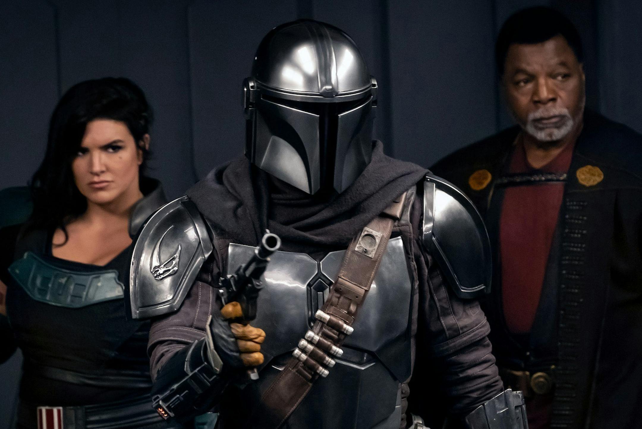 Gina Carano is Cara Dune, Pedro Pascal is the Manalorian and Carl Weathers is Greef Karga in "The Mandalorian." Season 2, Disney+