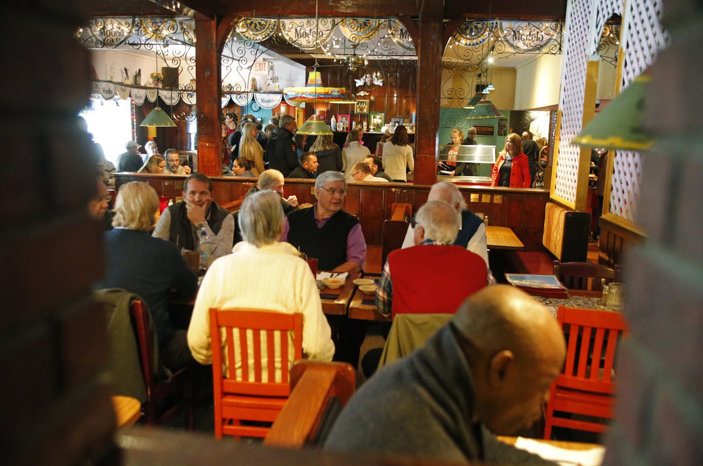 Lunch diners are viewed through a brick window between dining rooms inside Pepitos restaurant. ] Shari L. Gross &#xef; shari.gross@startribune.com After 46 years, the building that is home to Pepitos restaurant in south Minneapolis is up for sale. How will the end of this dining pioneer affect the neighborhood?