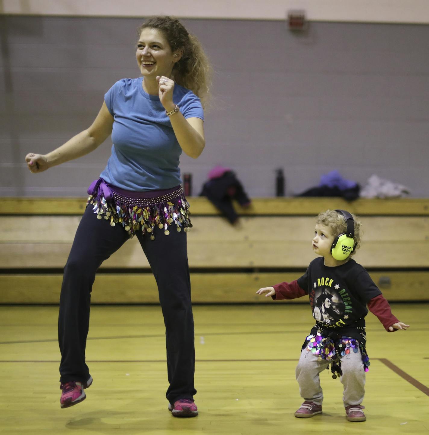 Working it out: Bernice Arias led a class at the Powderhorn Recreation Center, where Laura Wilhelm brought her daughter, Annola, 2.