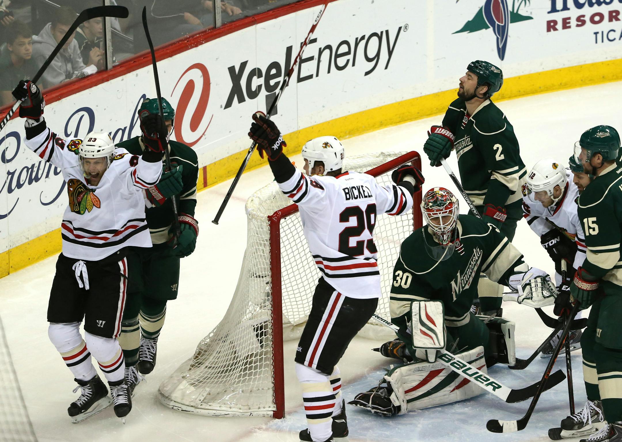 Chicago Blackhawks right wing Kris Versteeg (23), left, celebrated with Chicago Blackhawks left wing Bryan Bickell (29) after Versteeg scored the first goal of the game during the first period of their game Tuesday night at Xcel Energy Center in St. Paul. ] JEFF WHEELER ‚Ä¢ jeff.wheeler@startribune.com The Minnesota Wild faced the Chicago Blackhawks in game 6 of their playoff series Monday night, May 13, 2014 at Xcel Energy Center in St. Paul.