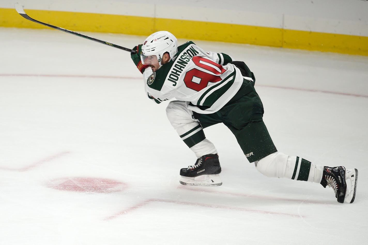 Minnesota Wild center Marcus Johansson scores a goal during overtime in the team's NHL hockey game against the Los Angeles Kings in Los Angeles, Saturday, Jan. 16, 2021. (AP Photo/Kelvin Kuo)