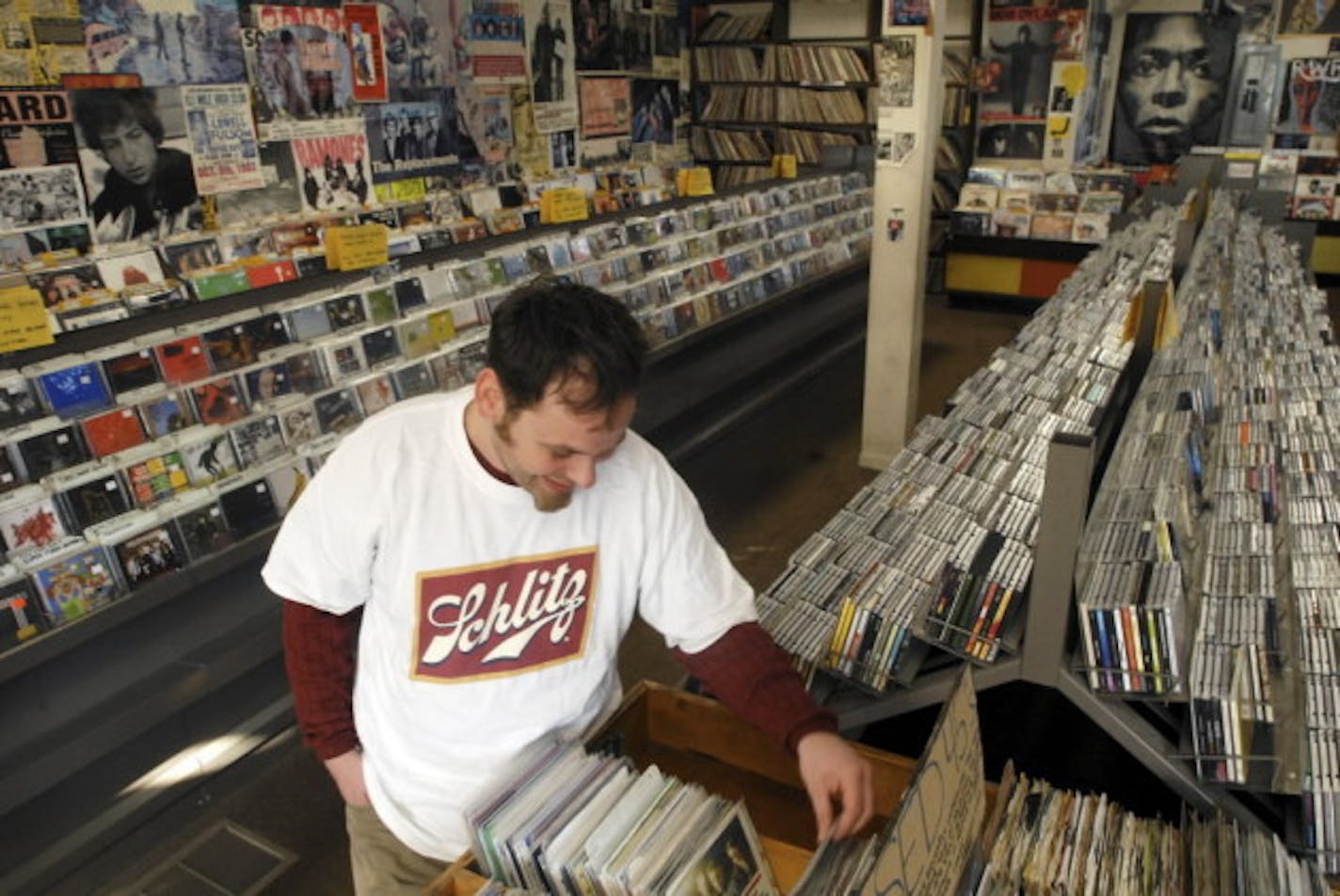 Tom Chevalier browsed the bins at Treehouse in 2008, when CDs were still a big part of its stock.