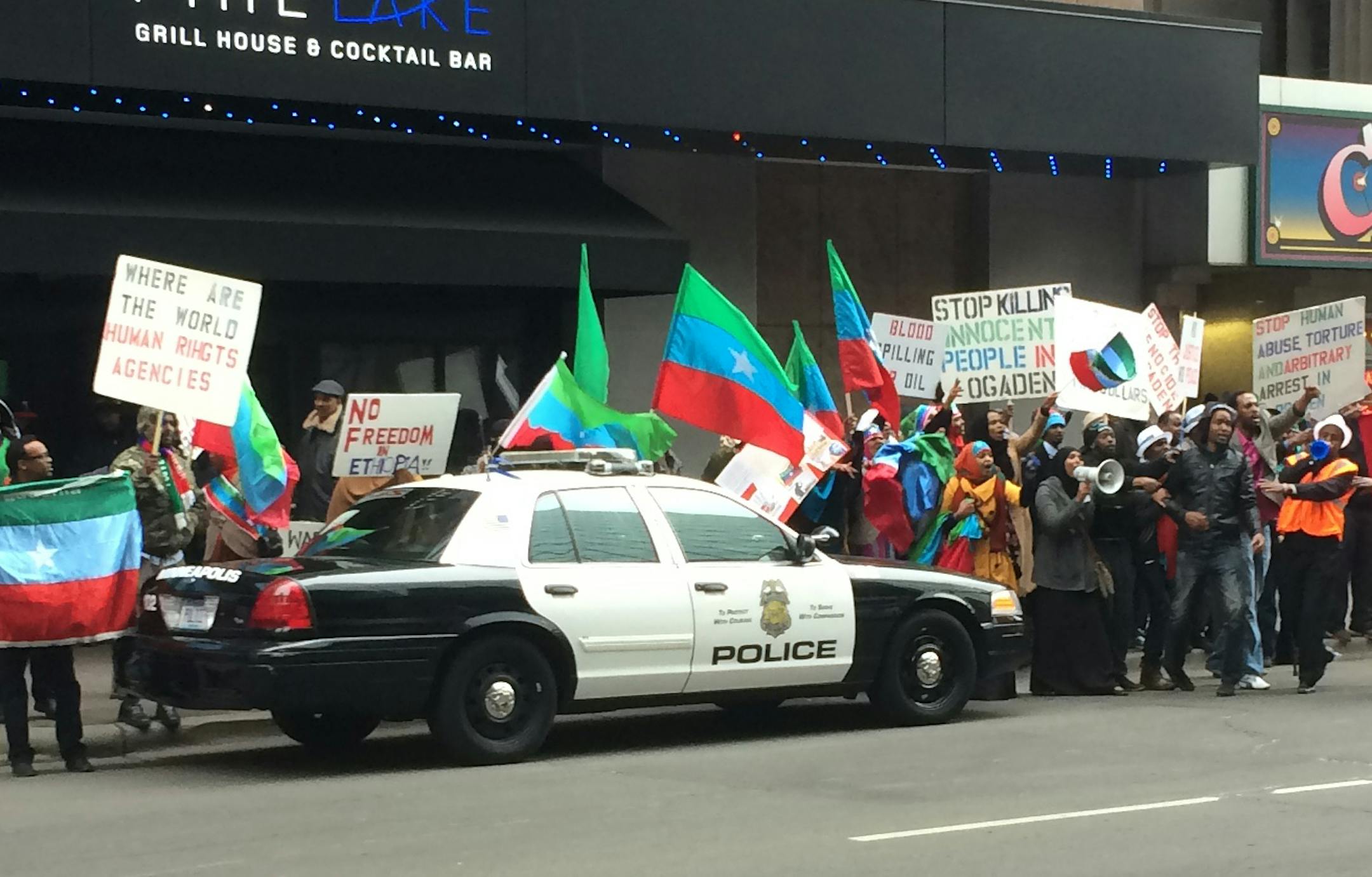 Protesters in downtown Minneapolis on Sunday were loud and angry as Ethiopian leader Abdi Mohamed Omar addressed thousands of local supporters at a hotel.
