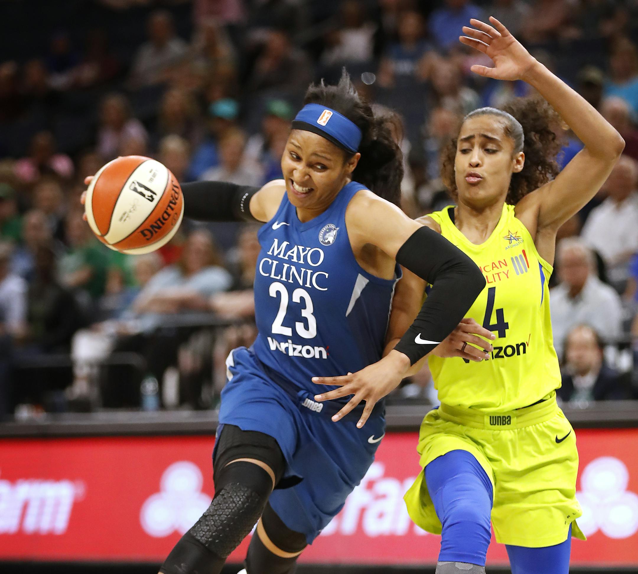 Minnesota Lynx forward Maya Moore (23) drives with the ball as Dallas Wings guard Skylar Diggins-Smith (4) pursues during the first half. ] LEILA NAVIDI ï leila.navidi@startribune.com BACKGROUND INFORMATION: The Minnesota Lynx against the Dallas Wings at Target Center in Minneapolis on Wednesday, May 23, 2018.