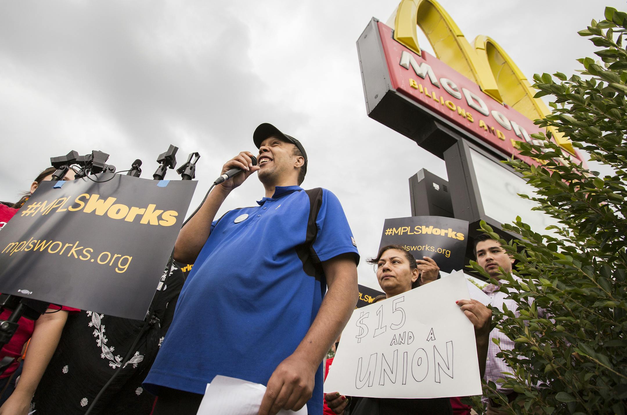 Steven Suffridge, a McDonald's worker, speaks during a day of action by workers groups outside of the McDonald's where Suffridge works on East Lake Street in Minneapolis on Thursday, August 6, 2015. ] LEILA NAVIDI leila.navidi@startribune.com / BACKGROUND INFORMATION: Hourly workers from McDonald&#x2019;s and other employers along with community supporters rallied to highlight the low pay and lack of benefits facing workers in Minneapolis as part of what they called "Minneapolis Works Day."