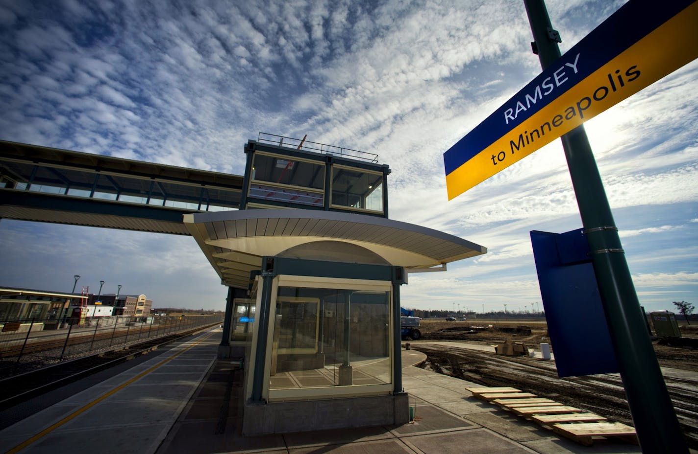 Workers put the finishing touches on the Ramsey station of the Northstar Commuter rail line, Thursday, November 8, 2012.