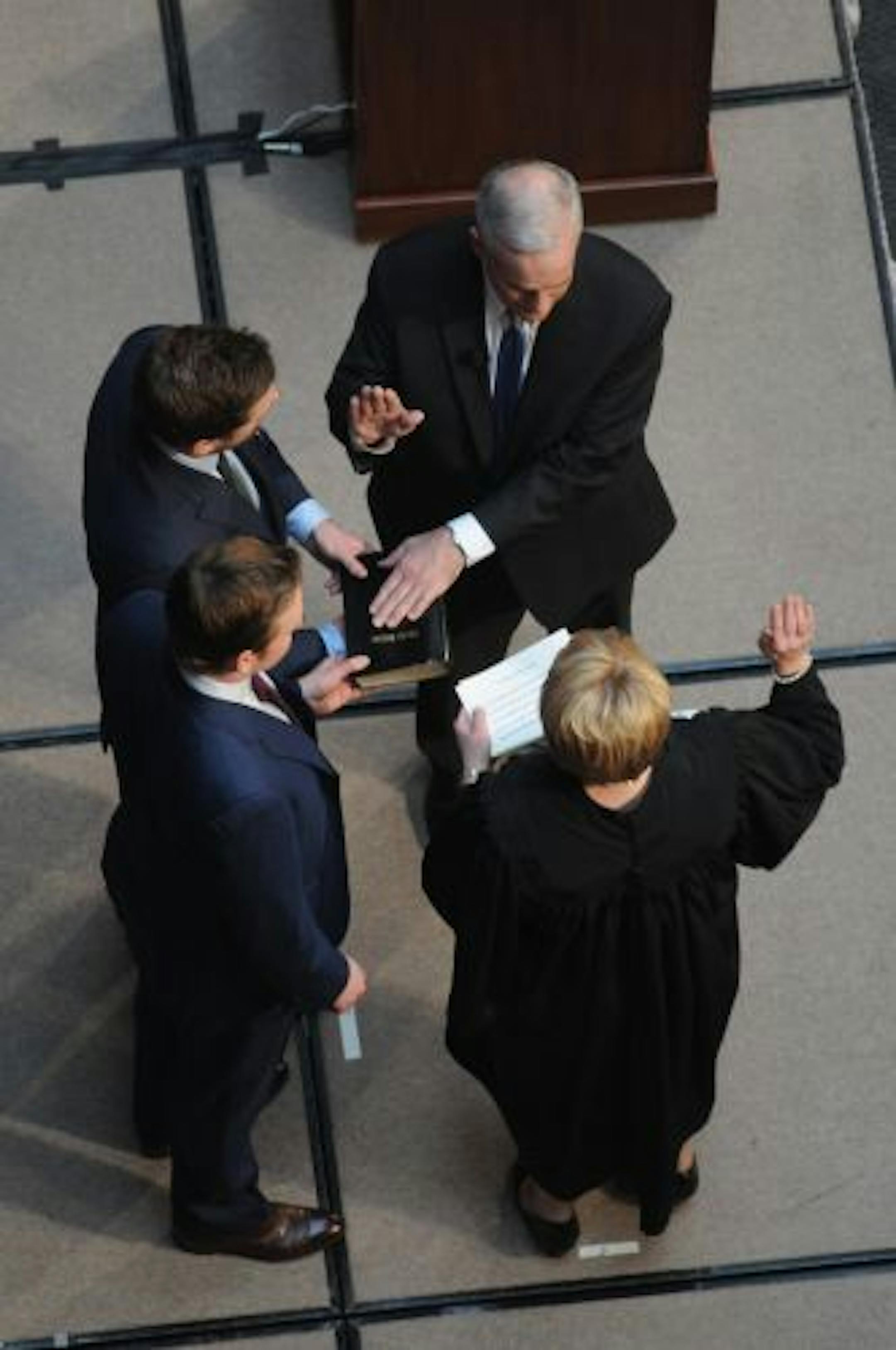 Gov. Mark Dayton was sworn in Monday by state Supreme Court Chief Justice Lorie Skjerven Gildea with Dayton's sons Andrew and Eric in attendance.