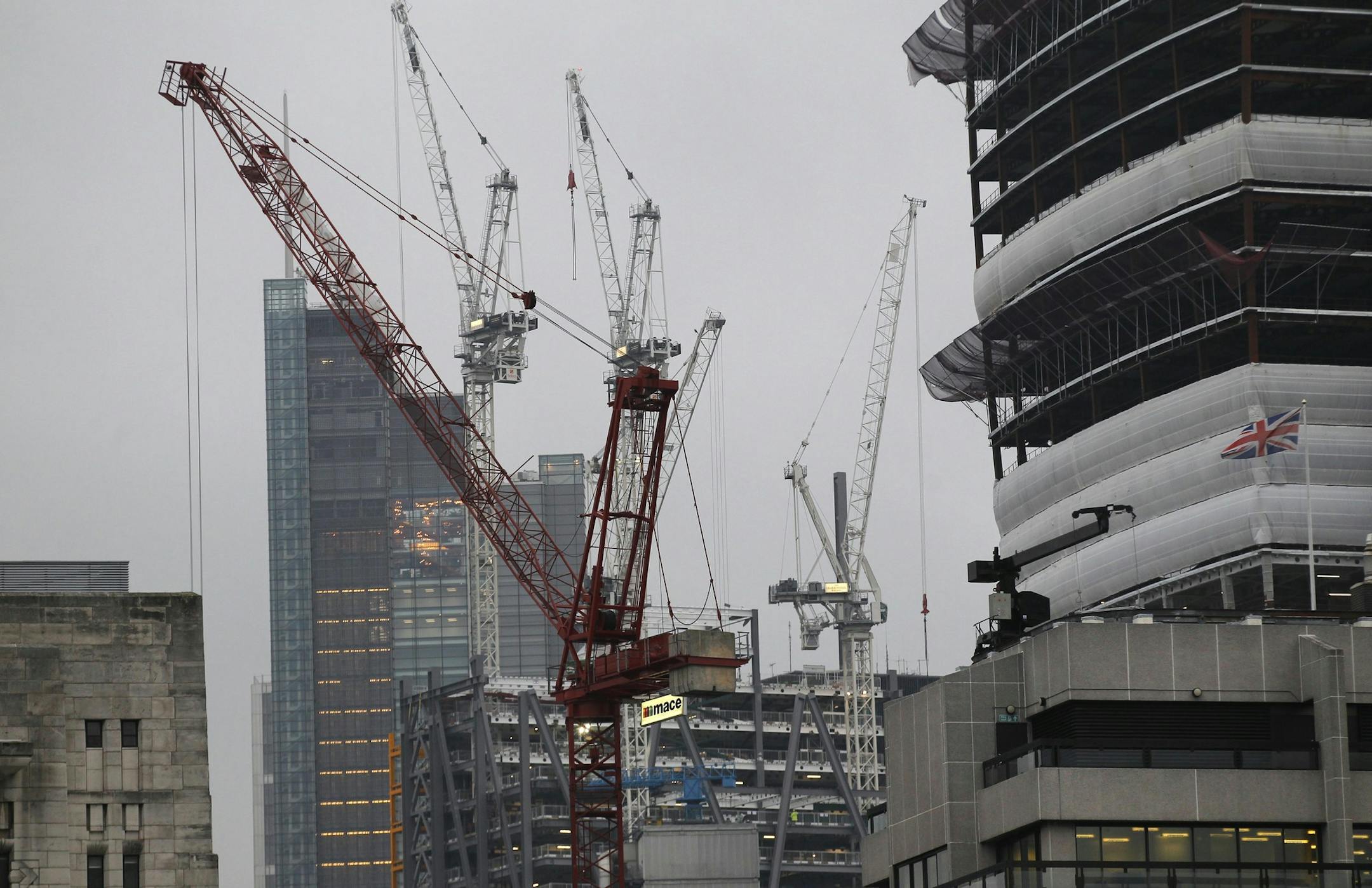 FILE - This Thursday, Oct. 25, 2012 file photo shows construction cranes in the City of London. The British economy grew by 0.6 percent in the first quarter compared with the previous three months, amid strong performances from nearly all the countryís main industries. The increase in annual gross domestic product, as reported by the Office for National Statistics Thursday July 25, 2013, was double the previous quarterís rate but in line with market expectations. The UKís service,