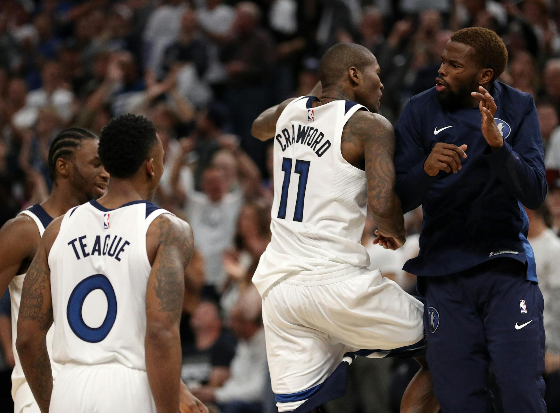 Minnesota Timberwolves guard Jamal Crawford (11) celebrated with his teammates after scoring a three point basket in the final minute of the second half. ] ANTHONY SOUFFLE ï anthony.souffle@startribune.com Game action from an NBA game between the Minnesota Timberwolves and the Utah Jazz Friday, Oct. 20, 2017 at the Target Center in Minneapolis.