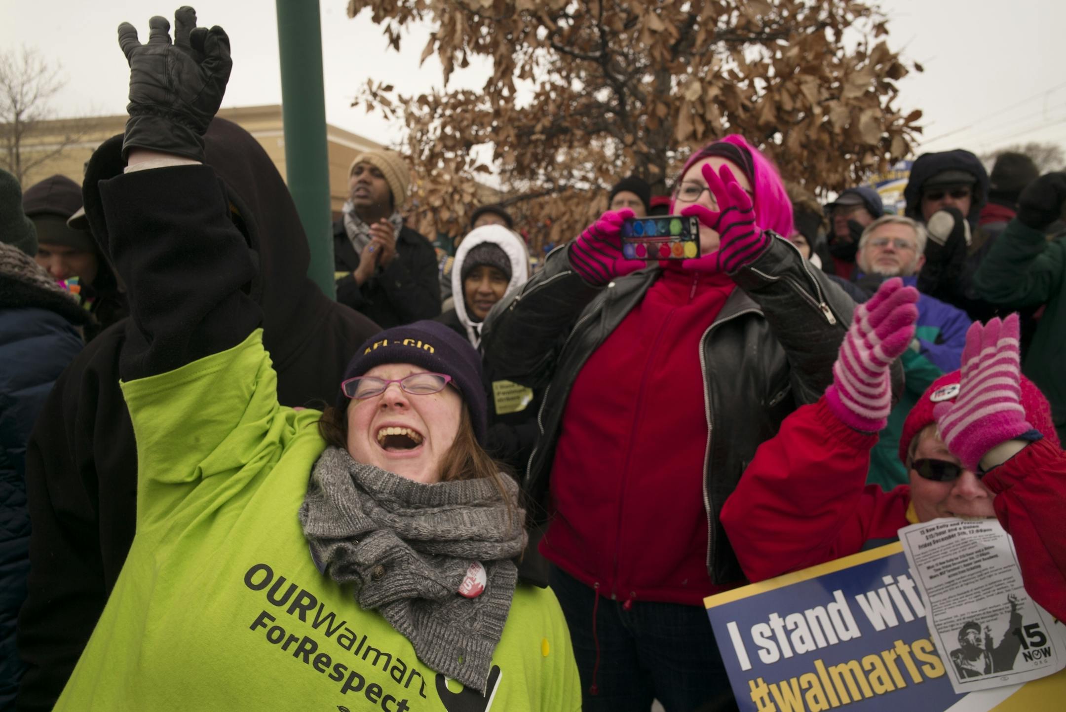 At the Walmart near the intersection of Snelling and University in St. Paul, protesters including Walmart customer service manager Cantare Davunt demanded better working conditions from the giant retailer. She said she was reprimanded for standing up for one of her associates.