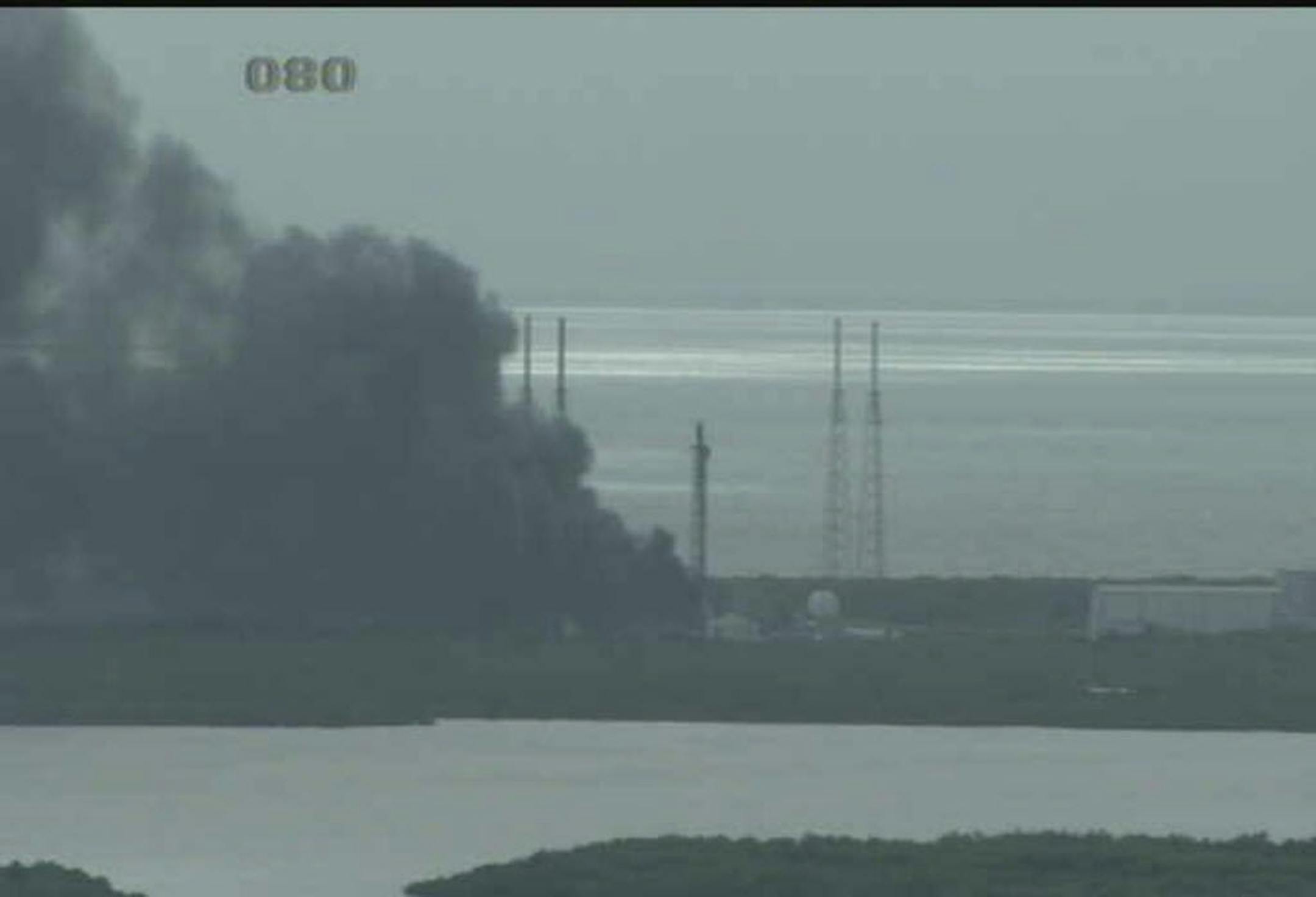 An image from a webcam from NASA'S Kennedy Space Center, shortly after a reported explosion at a SpaceX launch site Thursday morning.