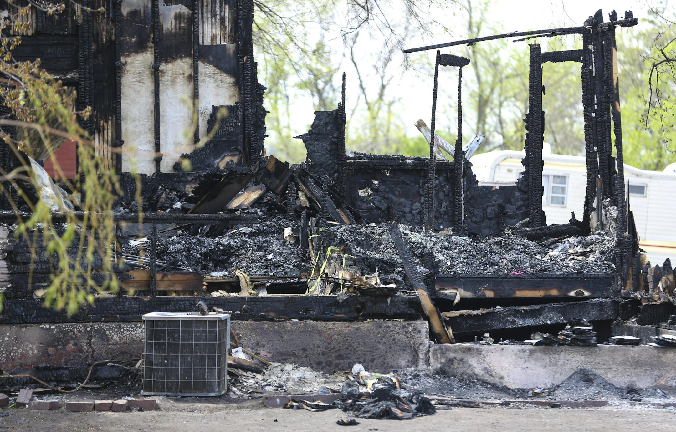 The burned farmhouse at the scene of a double homicide on Monday, May 4, 2015,in Balaton, Minn. ] RENEE JONES SCHNEIDER ï reneejones@startribune.com
