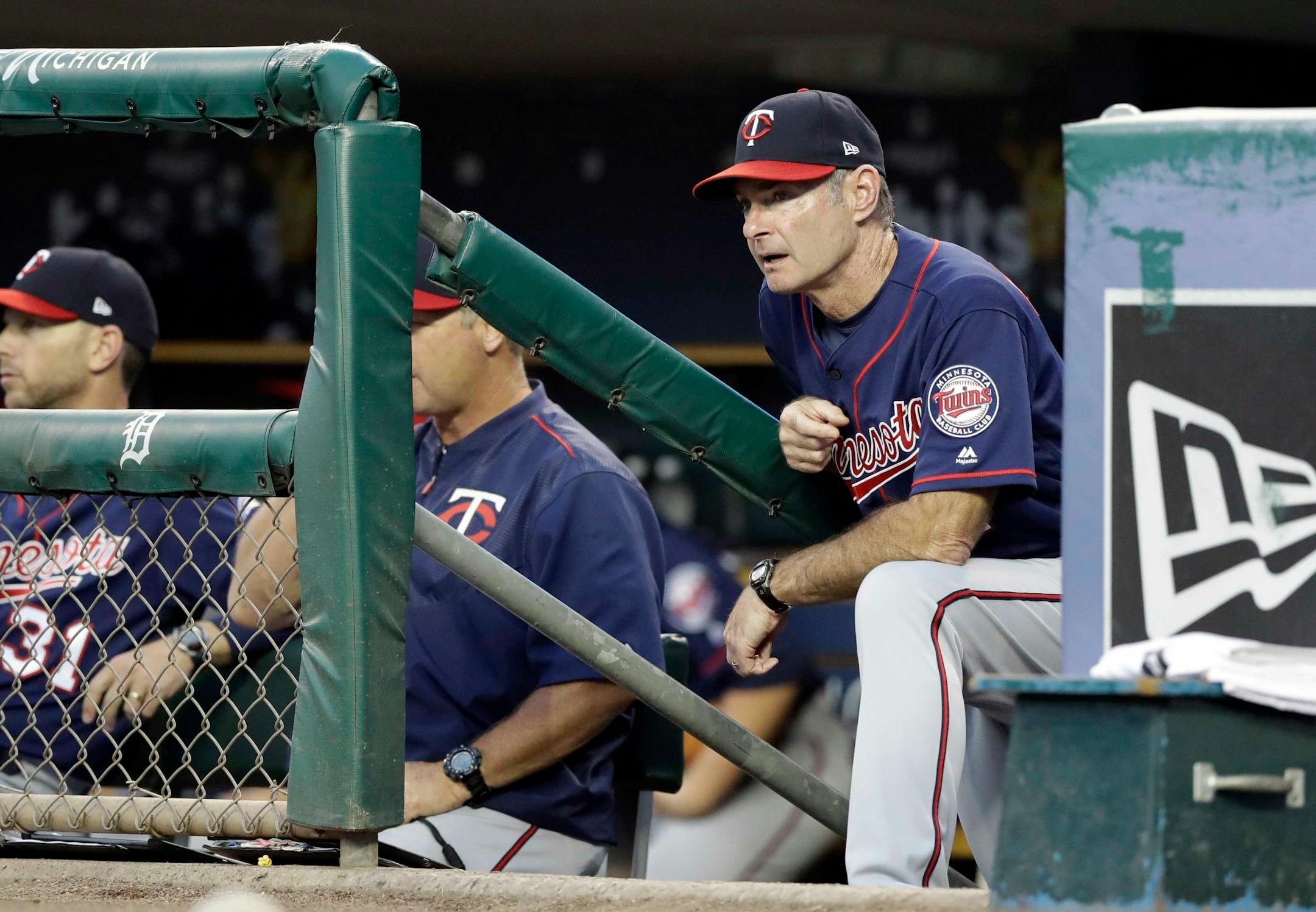 Minnesota Twins manager Paul Molitor looks out from the dugout during the first inning of a baseball game ad\, Thursday, Sept. 21, 2017, in Detroit. (AP Photo/Carlos Osorio)