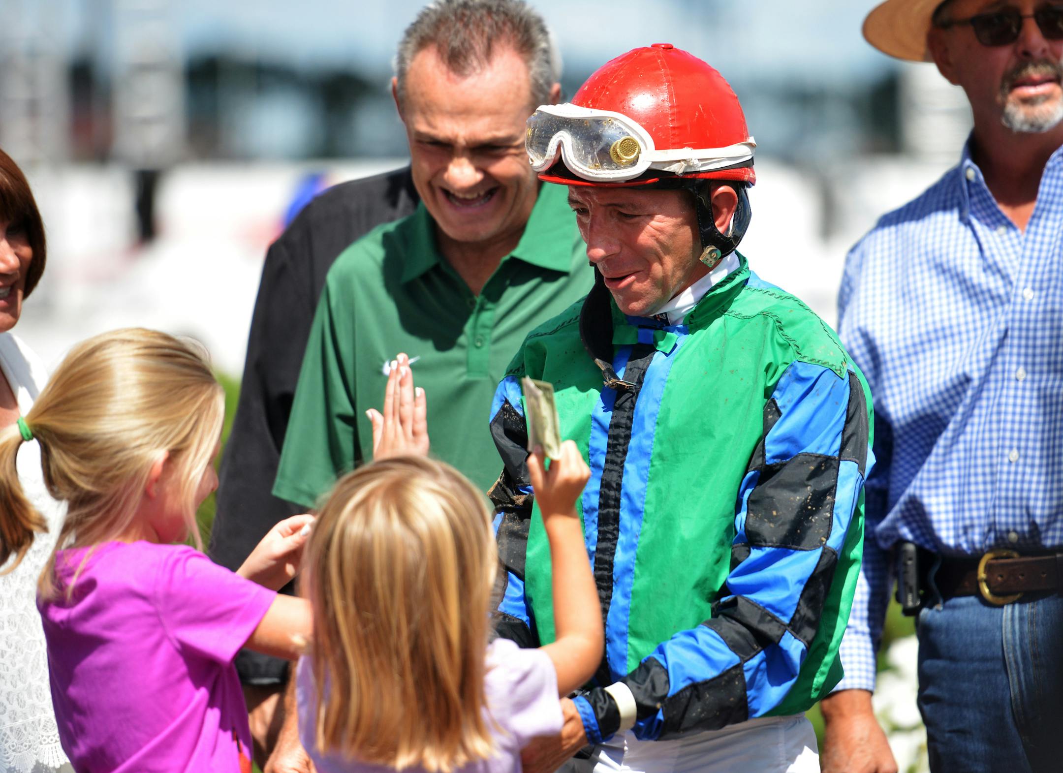 Hold for More's jockey Dean Butler celebrates in the winner's circle after taking first in the Crocrock Minnesota Sprint Championship. ] Mark Vancleave - mark.vancleave@startribune.com * The Minnesota Festival of Champions took place Sunday, Aug. 21, 2016 at Canterbury Park in Shakopee. The races featured Minnesota-bred horses.
