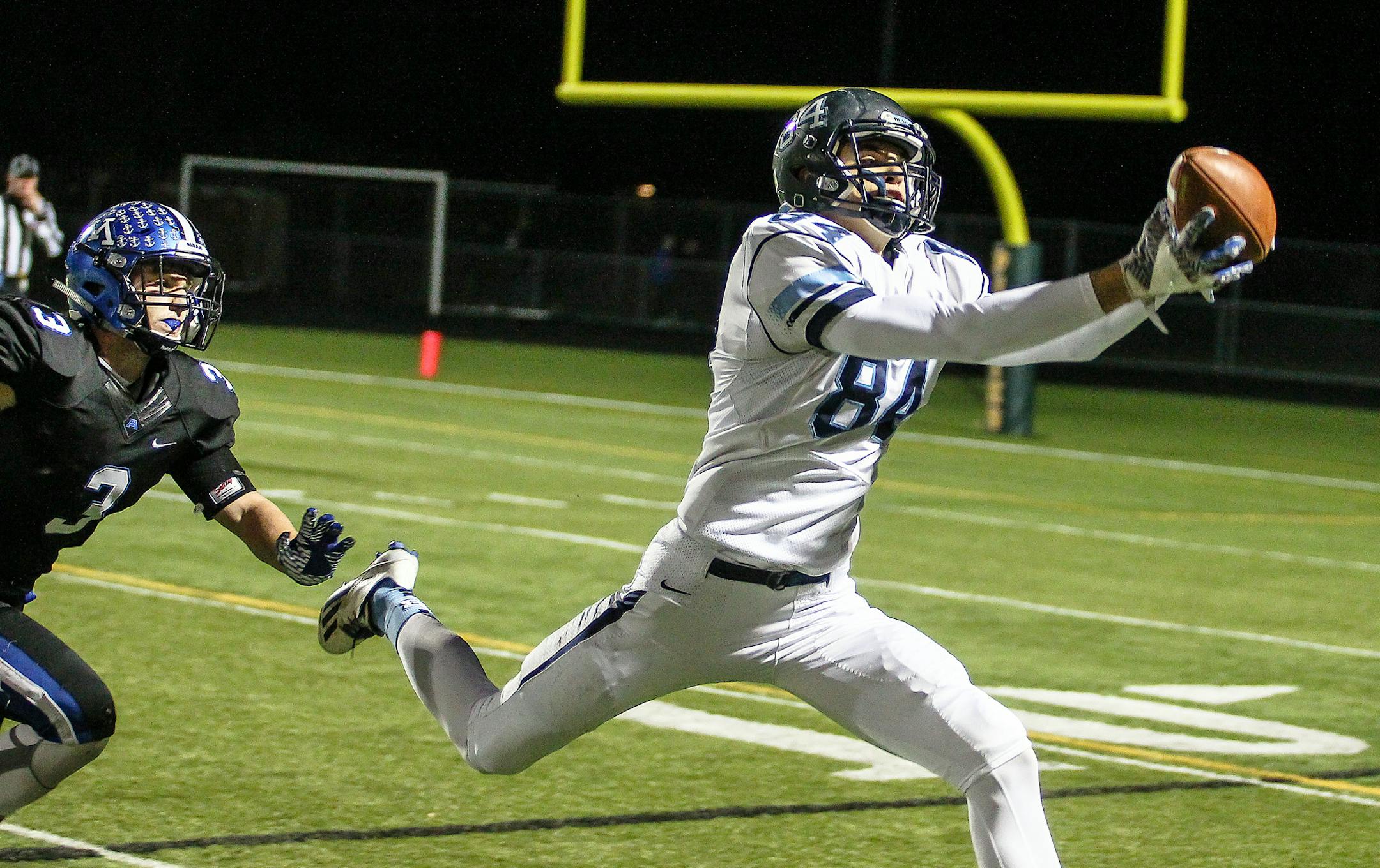In this photo: Kurtis Weigand&#xed;s reception on four-and-12 set up Blaine&#xed;s first touchdown. Class 6A quarterfinal, Minnetonka vs. Blaine at Park Center High School, 11-10-16, photo by Mark Hvidsten, SportsEngine