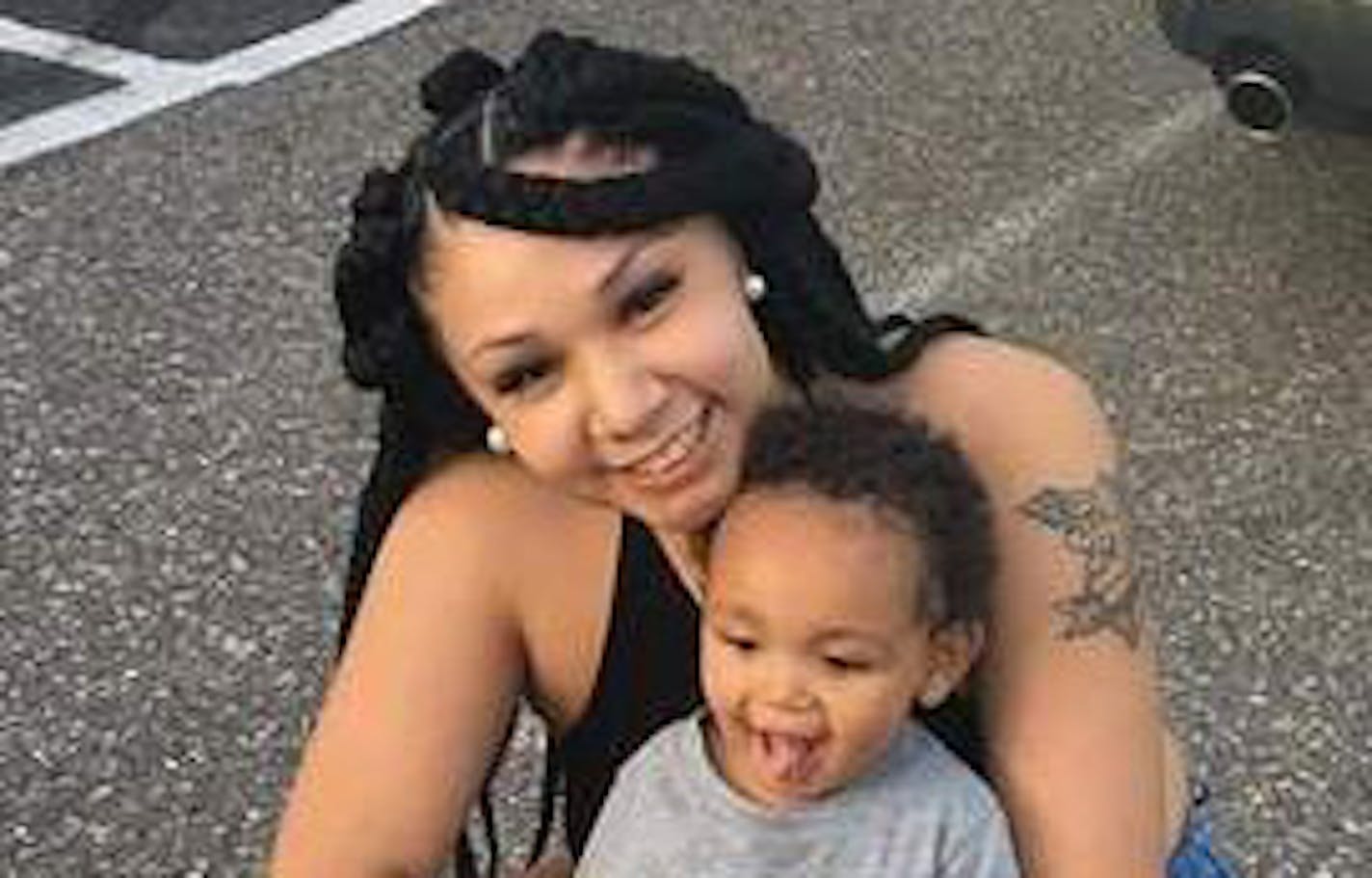 Arionna Buckinaga, pictured with her young son.