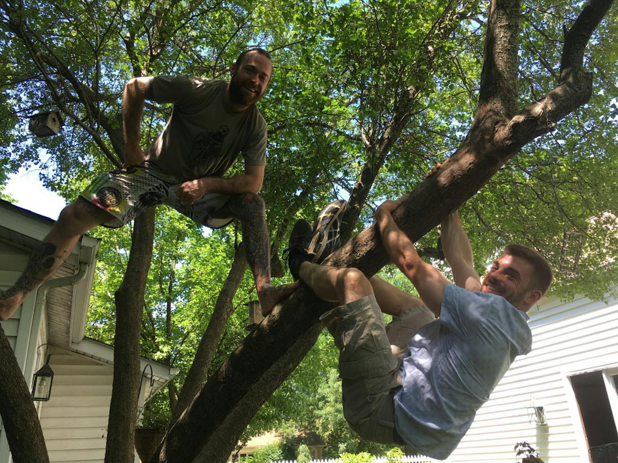 Matt Ward, left, and brother Ryan, veteran members of Benny and the Elevators entertainment team at the United Center, say they learned how to be daredevils in the backyard and playgrounds of their childhoods in Aurora, Ill. (Denise Crosby/Chicago Tribune/TNS) ORG XMIT: 1234916