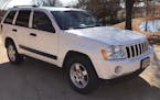A vehicle like this one was involved in a carjacking in Minneapolis. A 1-year-old boy was still in the back seat. It is a white 2005 Grand Cherokee be
