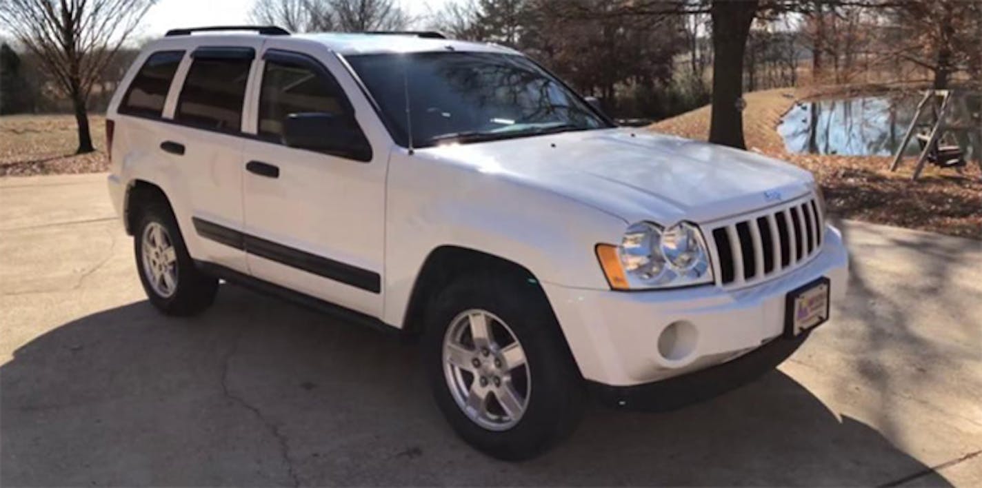 A vehicle like this one was involved in a carjacking in Minneapolis. A 1-year-old boy was still in the back seat. It is a white 2005 Grand Cherokee bearing Minnesota plates CRY 661.