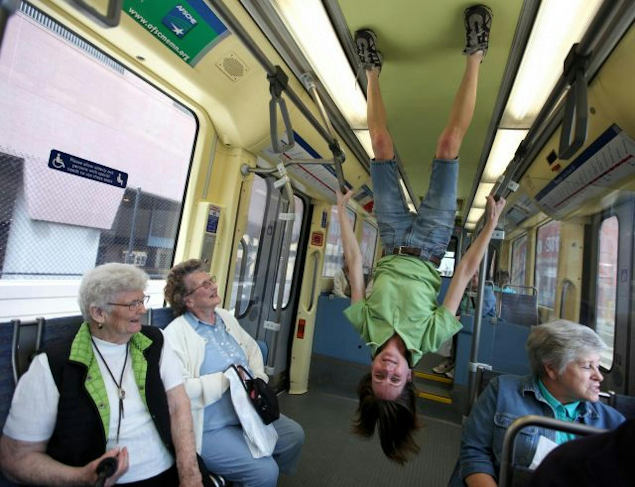Cyndi Larson, a guide for the Big Lake Seniors group, had some fun while waiting for the Northstar commuter rain to depart for Minneapolis.