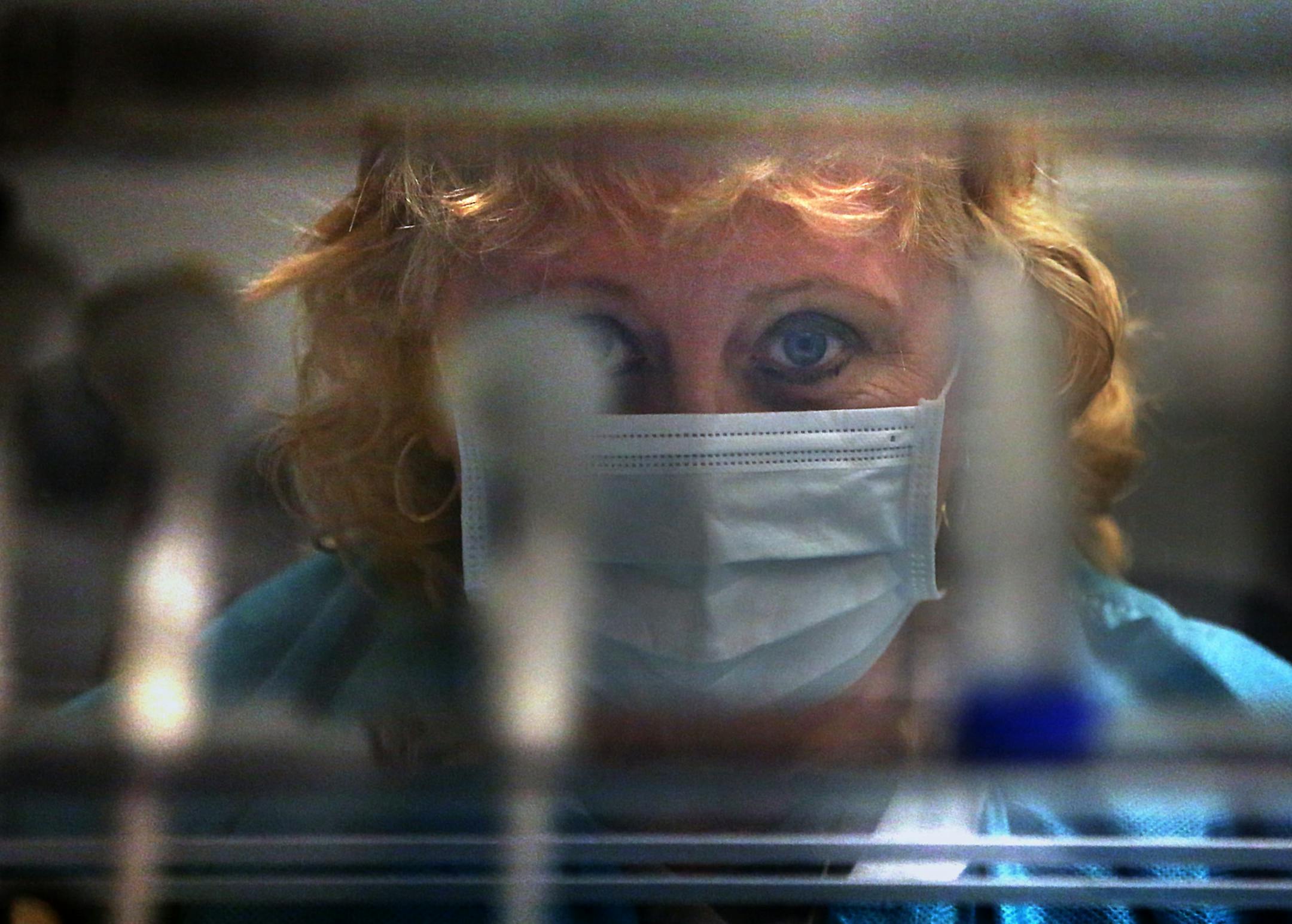 Suzanne Weston-Kirkegaard, a forensic biologist with the Hennepin County Sheriff‚Äôs Office, looked up from her work preparing DNA reference samples used to compare to crime scene evidence at the Hennepin County Crime Lab. ] JIM GEHRZ ‚Ä¢ jgehrz@startribune.com / Minneapolis, MN / March 6, 20134/ 11:00 AM - BACKGROUND INFORMATION: Hennepin investigators and prosecutors sifted through 9,300 cold case files, testing more than 500 biological samples for DNA. It was