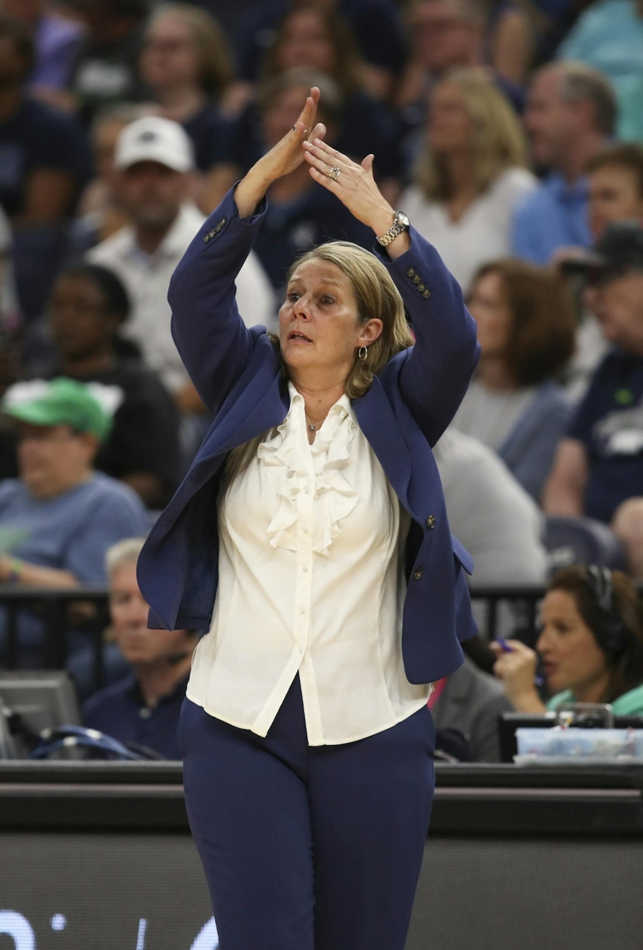 Lynx head coach Cheryl Reeve signaled for a fourth quarter time out.