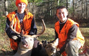 Kaitlyn and Jacob Zenner of Eagan with their opening day deer taken near Finlayson, Minn.