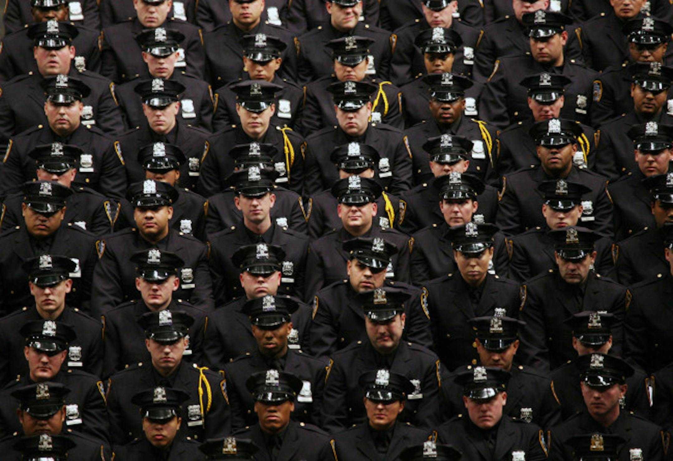 2008 file photo: A class of 1,129 police recruits graduates at Madison Square Garden in New York.
