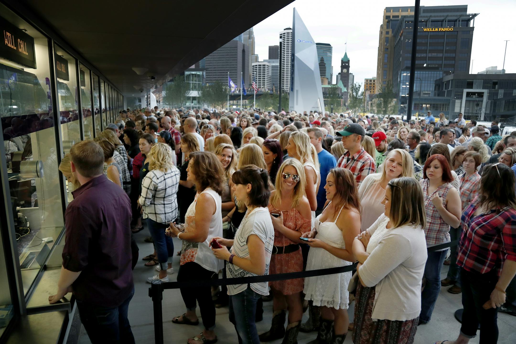 Fans stood in the will-call line Friday evening before entering the Luke Bryan concert at U.S. Bank Stadium.