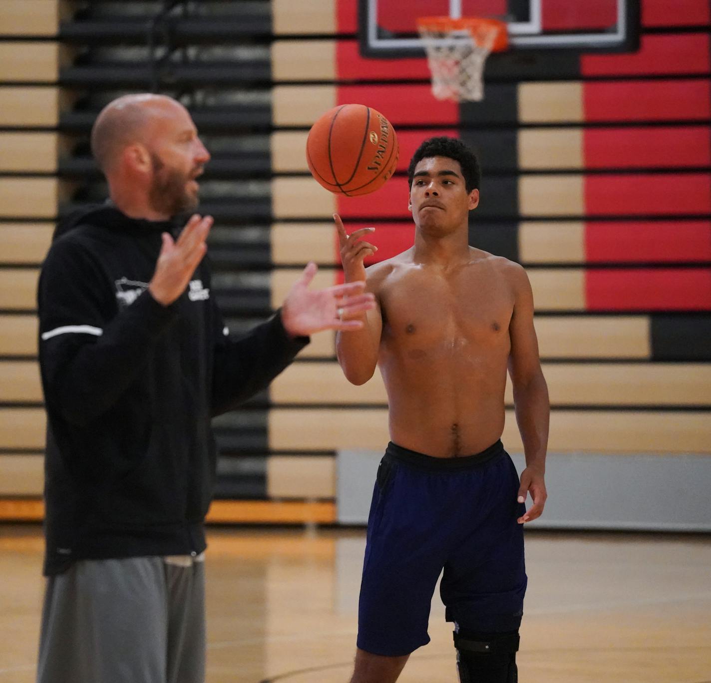 Tamin Lipsey spun a ball on his finger while listening to coach Jay Fuhrmann during a D1 Minnesota practice. ] Shari L. Gross • shari.gross@startribune.com AAU basketball is back, after looking like that might not happen. What this means for some top local recruits on teams such as D1 Minnesota.