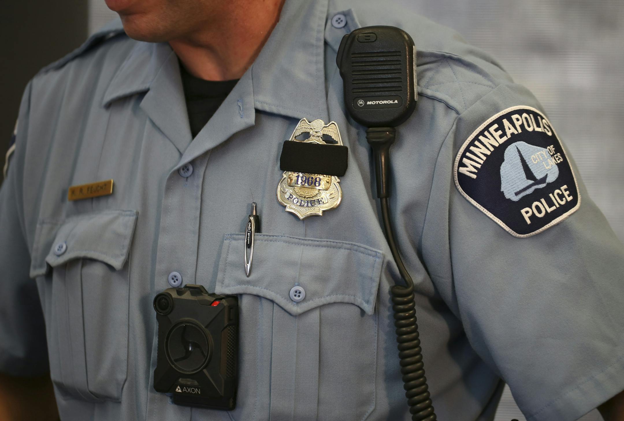 A Minneapolis police officer tested out a body camera before the department adopted them in 2017. A new policy prevents Minneapolis officers involved in critical incidents, including those involving deadly force, from reviewing body camera footage before completing an initial police report for the incident. (Jeff Wheeler/Minneapolis Star Tribune/TNS) ORG XMIT: 1702160
