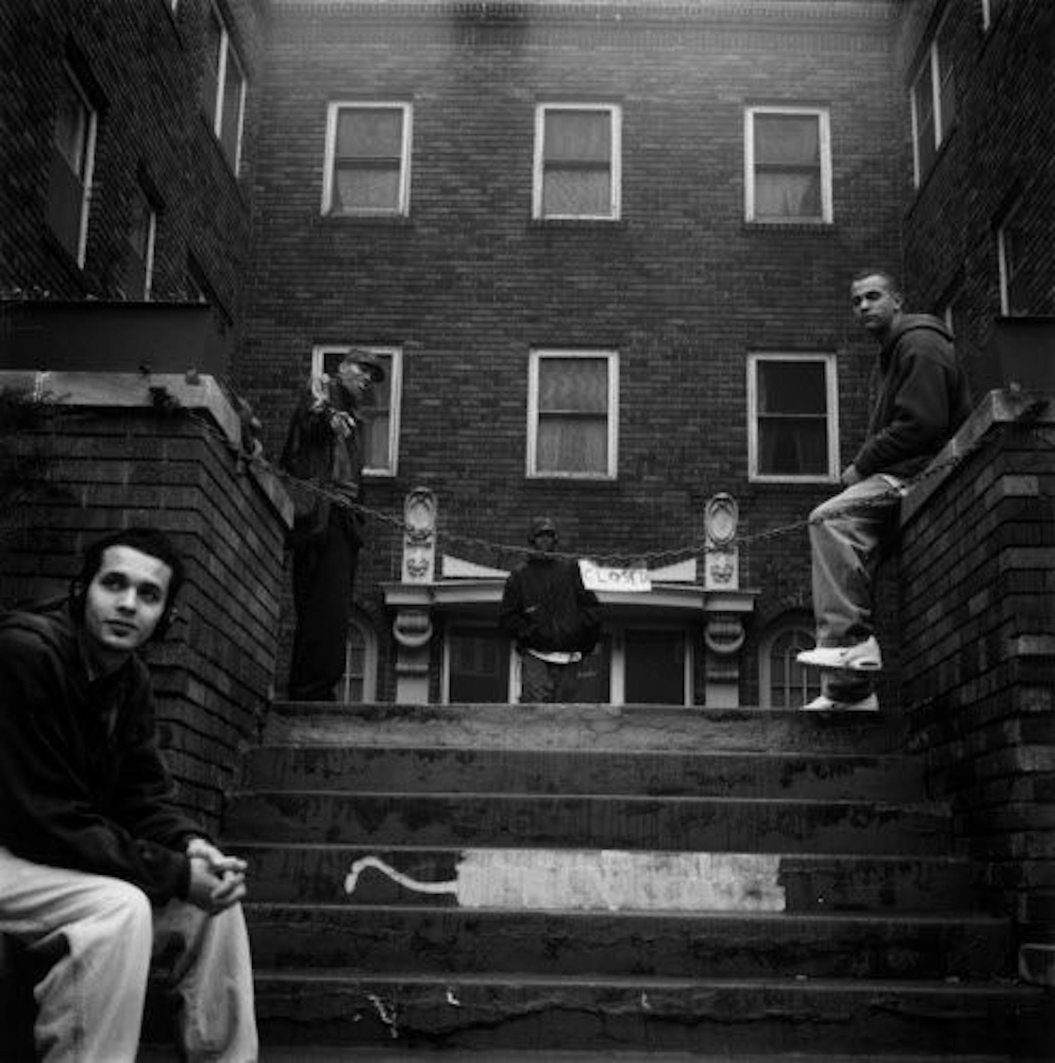 The Rhymesayers crew, circa 1996. From left, Slug (Sean Daley), Beyond (William Curtis), Stress (Brent Sayers) and Spawn (Derek Turner). Photo by Cameron Wittig.