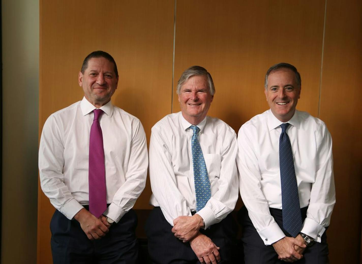 BMO Financial Group officials left to right Peter Myers ,R Hunt Greene, and Lyle J. Wilpon posed for a photo Thursday May 2, 2016 in Minneapolis MN.