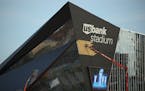 Construction workers attended to panels on the exterior of U.S. Bank Stadium Tuesday evening. ] JEFF WHEELER � jeff.wheeler@startribune.com The Minn