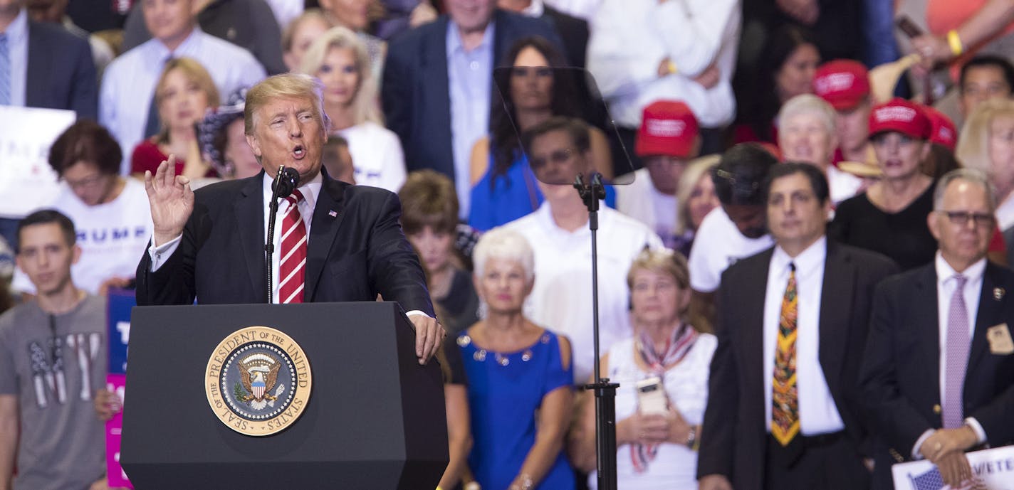 President Donald Trump speaks during a campaign-style rally at the Phoenix Convention Center, Aug. 22, 2017. (Tom Brenner/The New York Times) ORG XMIT: MIN2017082312100109