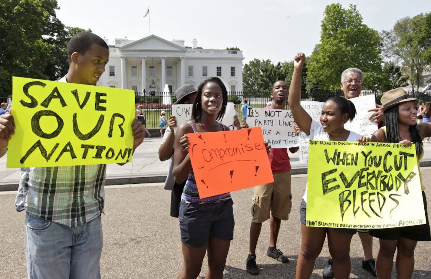 A small group of college students who are Facebook friends make an appeal to President Obama and Congressional leaders meeting inside the White House to reach a compromise during negotiations on the debt limit crisis, in Washington, Saturday, July 23, 2011.
