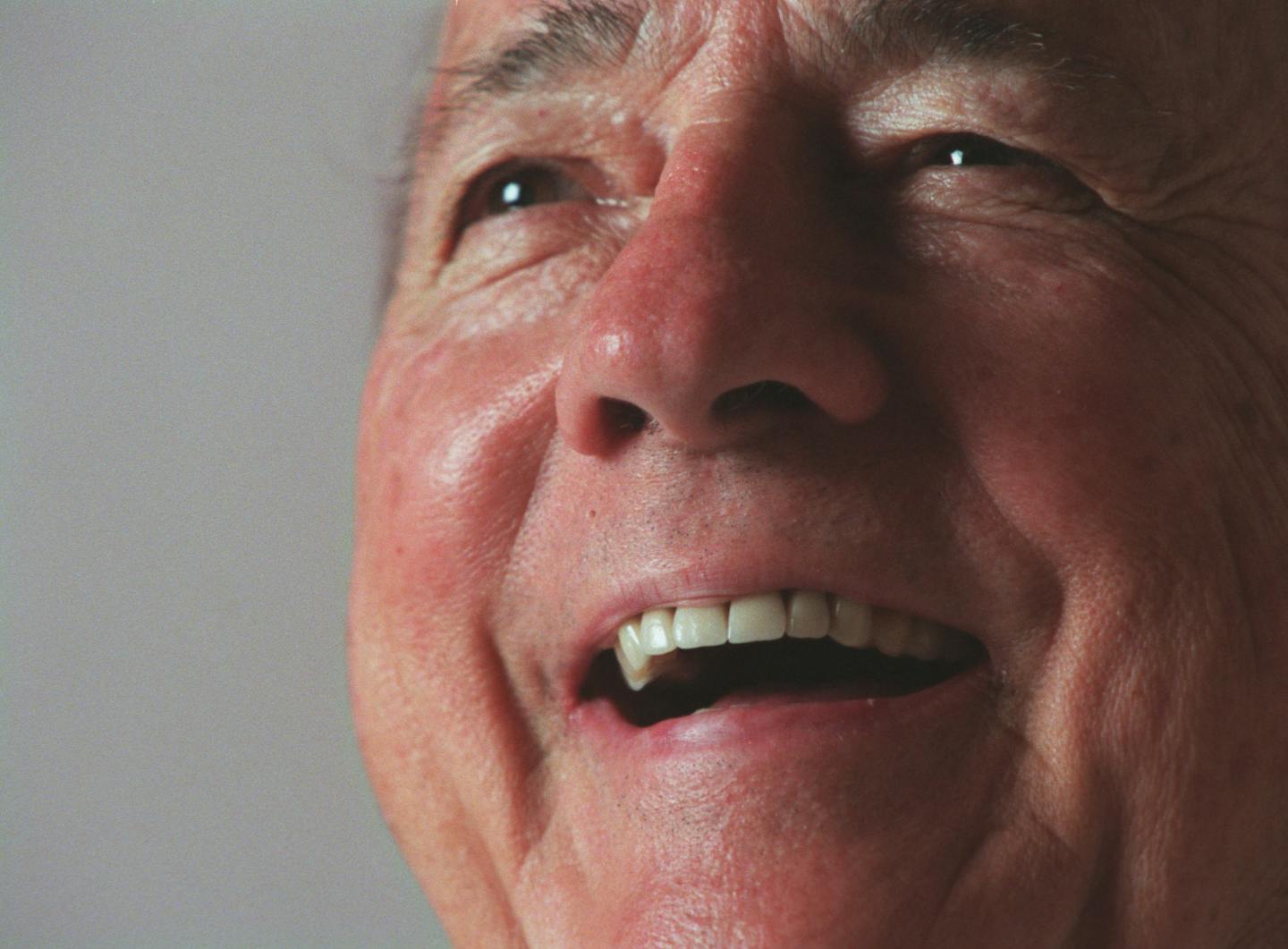 In this 2006 file photo, wrestling legend Verne Gagne reacts as he watches a WWF program on televison.