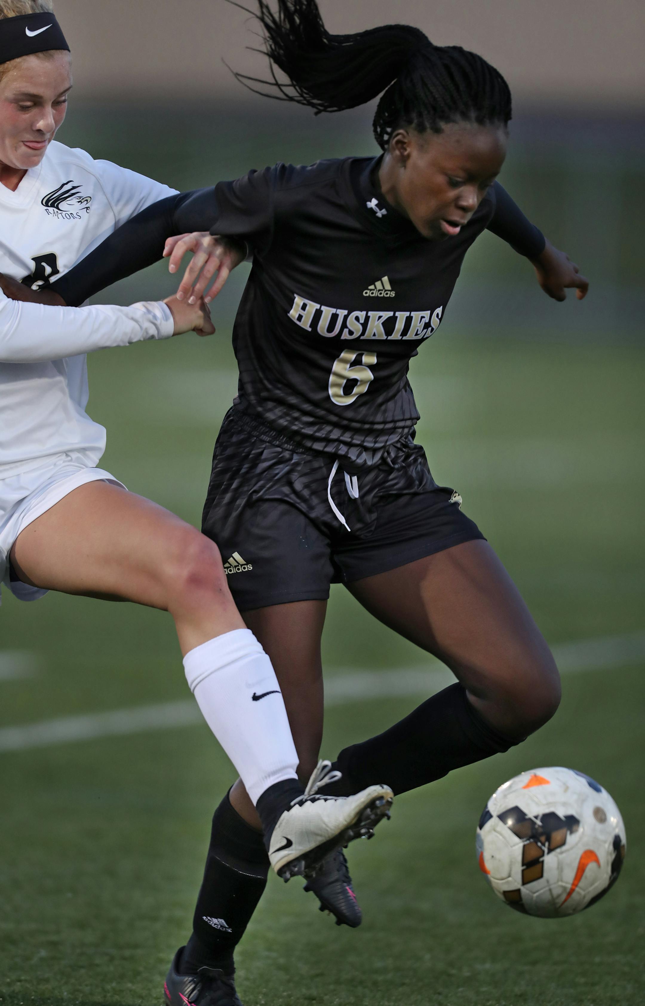 Brittany Mahowald,8, of East Ridge battled Rebecka Musungu(6) for control of the ball. ]In a Quarterfinal game class 2A girls' soccer game between East Ridge and Andover at Chicago Lakes H.S.Richard Tsong-Taatarii/rtsong-taatarii@startribune.com