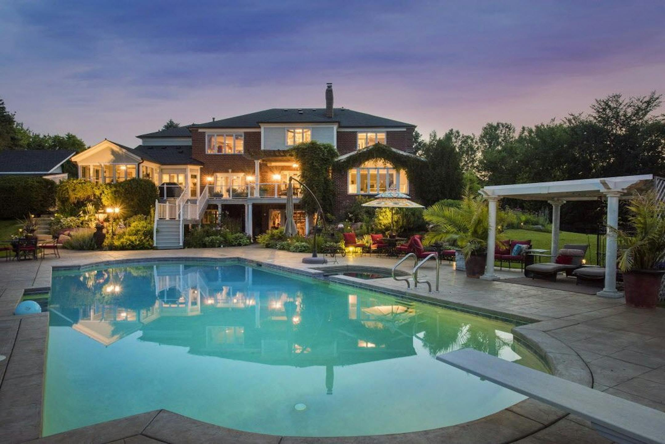 This 1987 Georgian-style estate is on 23 wooded acres and only a block from the town of Long Lake. It costs $4.75 million.