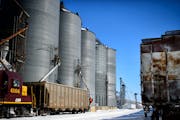 A federal judge in St. Paul has sentenced a 66-year-old Minnesota farmer to three years in prison for falsely selling rail cars full of conventional g