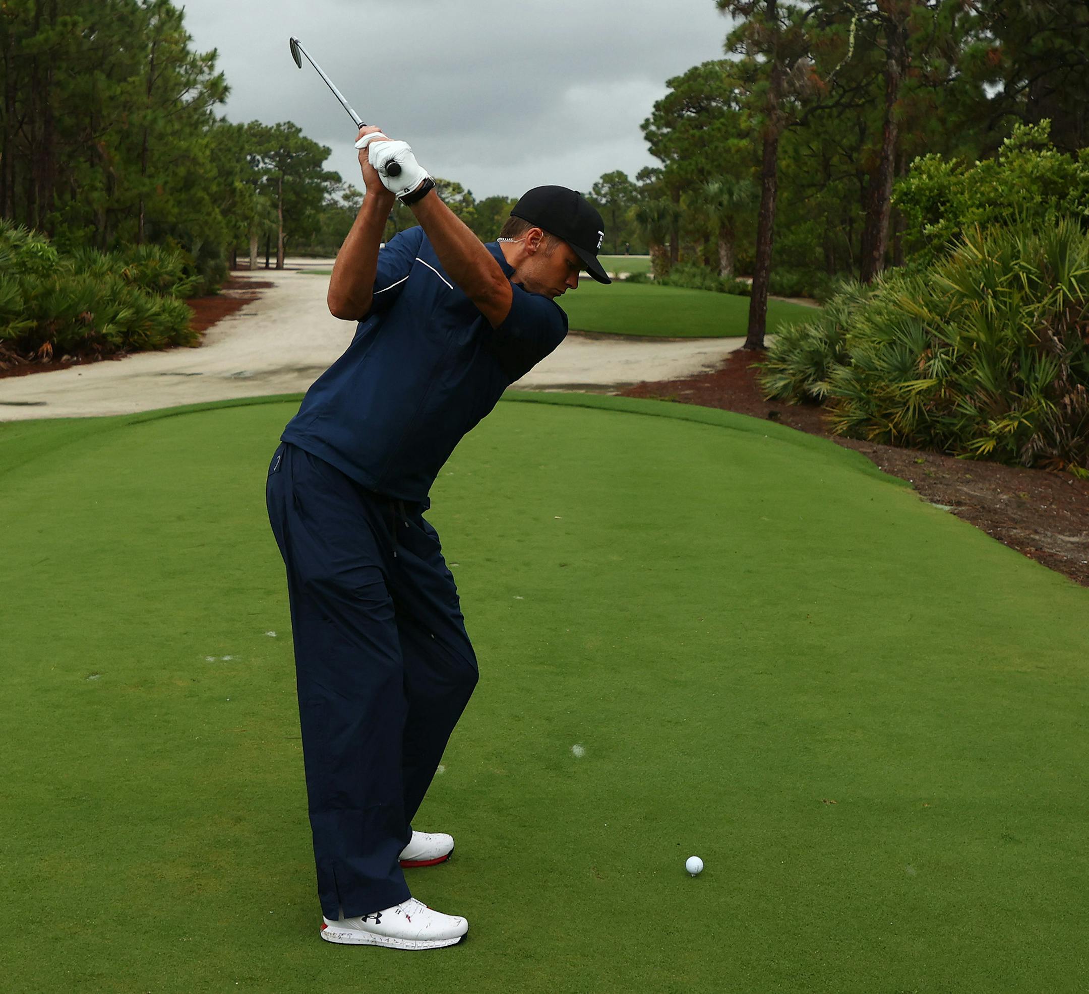 NFL quarterback Tom Brady of the Tampa Bay Buccaneers plays his shot from the 11th tee during The Match: Champions For Charity at Medalist Golf Club on Sunday, May 24, 2020 in Hobe Sound, Fla. (Mike Ehrmann/Getty Images for The Match/TNS) ORG XMIT: 1670821