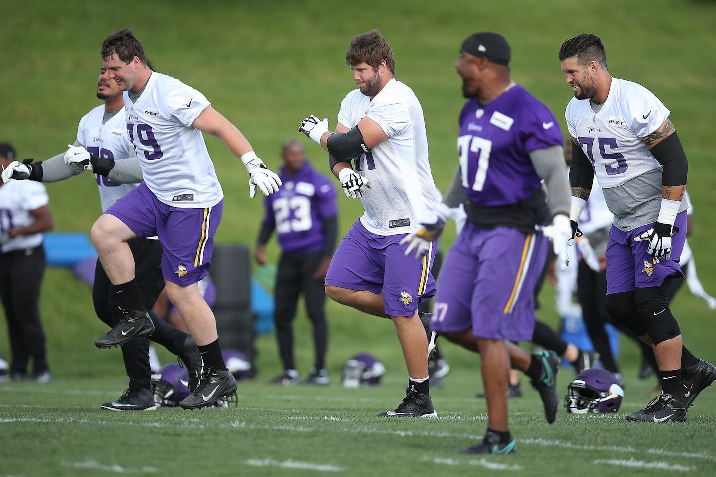 Riley Reiff, center, took to the field for practice at Winter Park, Wednesday, June 14, 2017 in Eden Prairie, MN.