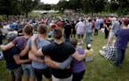 The crowd listened to speakers at a vigil held at Loring Park for the victims of the Orlando shooting. ] CARLOS GONZALEZ cgonzalez@startribune.com - J