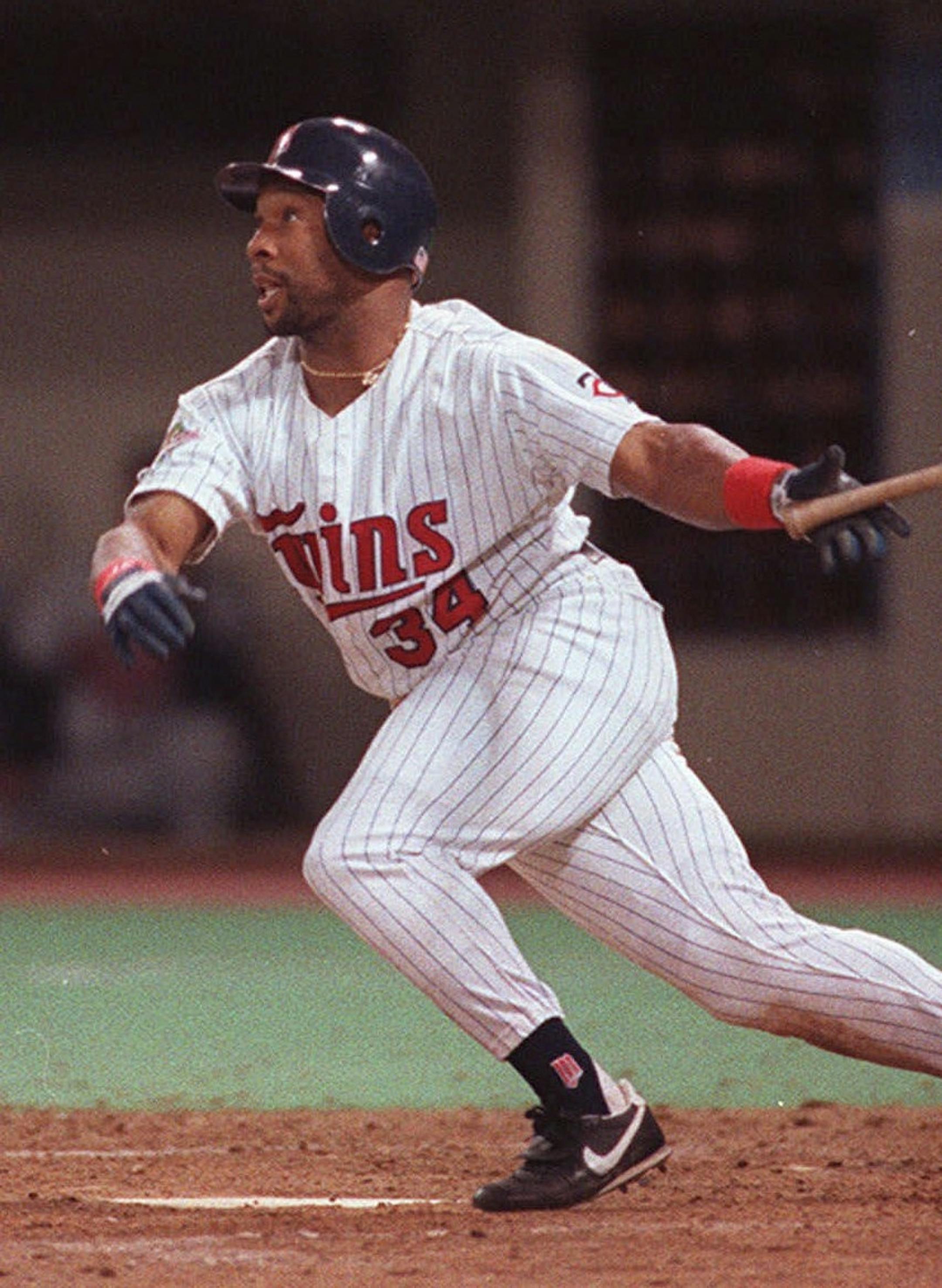 Kirby Puckett watches his 11th inning home run that ended Game 6 of the 1991 World Series. the Twins won Game 7 the next night.