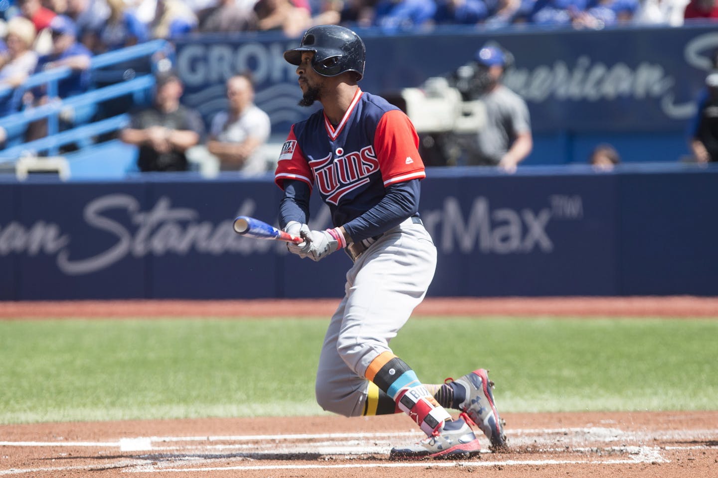 Minnesota Twins Byron Buxton watches the flight of the ball after hitting an RBI single off Toronto Blue Jays starting pitcher Joe Biagini during first inning American League baseball action in Toronto on Sunday, Aug. 27, 2017. (Chris Young/The Canadian Press via AP)