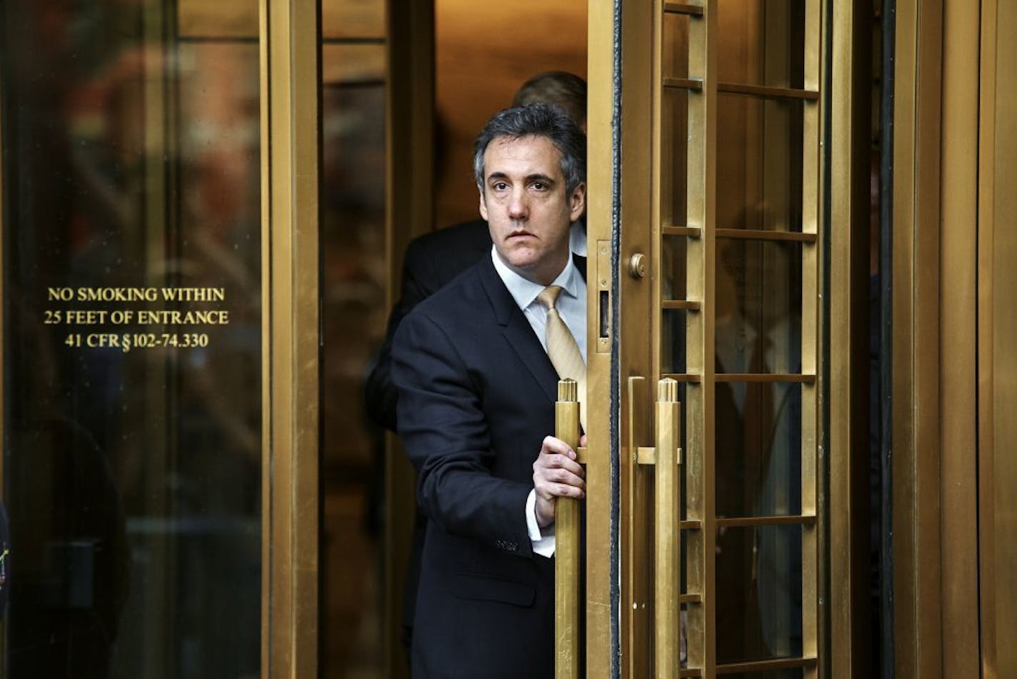 Michael Cohen, President Donald Trump's personal lawyer and longtime fixer, leaves federal court, in New York, Aug. 21, 2018. The trials of both Cohen and Trump's former campaign chairman, Paul Manafort, faced extraordinary legal developments, further coalescing Trump with the criminal investigations he has tried to distance from his White House.